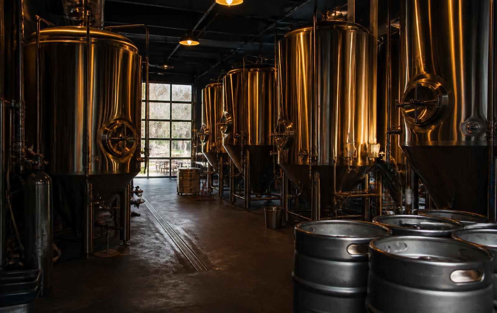 Craft brewery tanks and kegs served by the Brew Route network